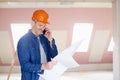 Construction worker consulting with somebody Royalty Free Stock Photo