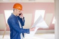 Construction worker consulting with somebody Royalty Free Stock Photo