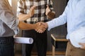 construction worker and contractor. Client shaking hands with team builder in renovation site. Royalty Free Stock Photo