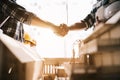 construction worker and contractor. Client shaking hands with team builder in renovation site in the morning Royalty Free Stock Photo