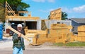 Construction worker or contractor in a hard hat working on a house construction site