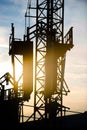 Construction worker, crane and building at sunset Royalty Free Stock Photo