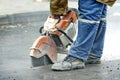 Construction worker with cut-off machine Royalty Free Stock Photo