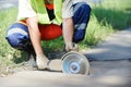 Construction worker with cut-off machine Royalty Free Stock Photo