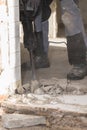 Construction worker with demolition hammer