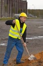 Construction worker digging ground Royalty Free Stock Photo