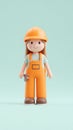 Construction worker doll wearing orange overalls and helmet Royalty Free Stock Photo