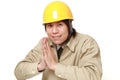 Construction worker folding his hands in prayer Royalty Free Stock Photo