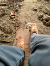 Construction worker formal shoes at the construction site with blue trouser