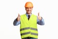 Construction Worker Gesturing Thumbs Up Posing On White Background Royalty Free Stock Photo