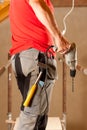 Construction worker with hand drill Royalty Free Stock Photo