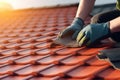 Construction worker hands working on roof tiles installation closeup. Generative AI