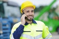 Construction worker having conversation on phone Royalty Free Stock Photo