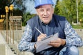construction worker in helmet writing on clipboard Royalty Free Stock Photo