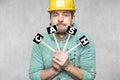 Construction worker holding a blackboard with space for text or text, copy space Royalty Free Stock Photo