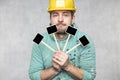 Construction worker holding a blackboard with space for text or text, copy space Royalty Free Stock Photo