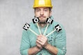 Construction worker holding a blackboard with space for text or text, copy space Royalty Free Stock Photo