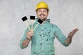 Construction worker holding a blackboard with space for text or text, copy space Royalty Free Stock Photo