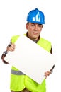 Construction worker holding the blank poster Royalty Free Stock Photo