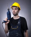 Construction worker holding a drill Royalty Free Stock Photo