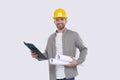 Construction Worker Holding House Plan and Clipboard in Hands. Architect Holding Blueprints. Yellow Hard Helmet. Worker