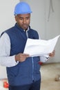 construction worker holding plan Royalty Free Stock Photo