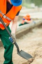 Construction worker holding shovel Royalty Free Stock Photo