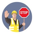 Construction worker holding STOP sign in his hand Royalty Free Stock Photo