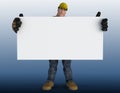 Construction worker holding a white sign board - blue background Royalty Free Stock Photo