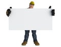 Construction worker holding a white sign board Royalty Free Stock Photo