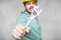 The construction worker holds the key in his hands, the key as a source of inspiration and ingenuity Royalty Free Stock Photo