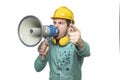 The construction worker holds a megaphone in his hands, the concept of issuing orders