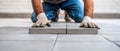 Construction Worker Installing Concrete Paving Stones Royalty Free Stock Photo
