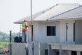 Construction worker are installing Crane hooks at the precast concrete wall, Precast house construction Royalty Free Stock Photo