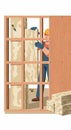 A construction worker is installing insulation between wooden st Royalty Free Stock Photo