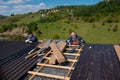 Construction worker installing a new roof Royalty Free Stock Photo