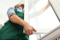 Construction worker installing new window Royalty Free Stock Photo