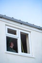 Construction Worker Installing New Windows In House Royalty Free Stock Photo