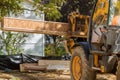 A construction worker installing silent floor joists in new construction forklift stacker loader Royalty Free Stock Photo