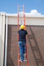 Construction Worker on Ladder Royalty Free Stock Photo