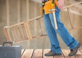 Construction Worker with ladder in front of construction site Royalty Free Stock Photo