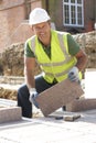 Construction Worker Laying Blockwork Royalty Free Stock Photo