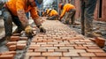 Construction Worker Laying Bricks on a New Pathway Royalty Free Stock Photo