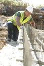 Construction Worker Laying Foundations Royalty Free Stock Photo