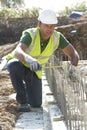 Construction Worker Laying Foundations Royalty Free Stock Photo