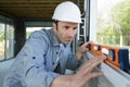 construction worker with level tool Royalty Free Stock Photo