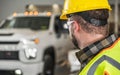 Construction Worker Looking at His Brand New Pickup Truck Royalty Free Stock Photo