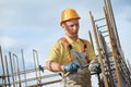 Construction worker making reinforcement