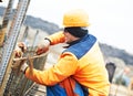 Construction worker making reinforcement for concrete work