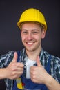 Construction worker making thumbs up sign